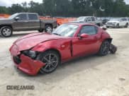 ✅ 2019 Mazda MX-5 Miata Grand Touring • VIN: JM1NDAM71K0302276 • Лот: 63149965. Опубликован ранее на Copart с пробегом 21 005 миль. Бесплатный доступ к архиву аукционных продаж из США и подробный отчёт об истории автомобиля на DreamBid. Изображение 1.