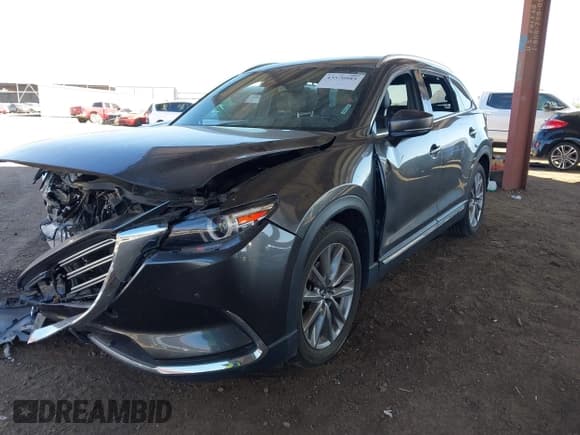 ✅ 2020 Mazda CX-9 Grand Touring • VIN: JM3TCADY0L0412697 • Lot: 43570985. Listed on IAAI with 59,725 mi. Free auction sales archive from the USA and detailed vehicle history report at DreamBid. Image 2.