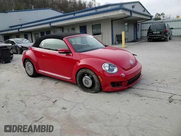 ✅ 2015 Volkswagen Beetle 1.8T • VIN: 3VW517AT0FM804032 • Лот: 80767004. Опубликован ранее на Copart с пробегом 77 938 миль. Бесплатный доступ к архиву аукционных продаж из США и подробный отчёт об истории автомобиля на DreamBid. Изображение 11.