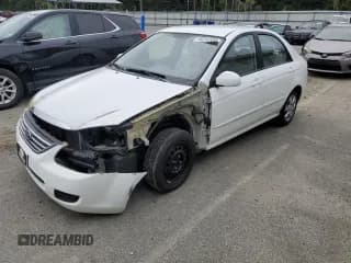 ✅ 2009 Kia Spectra LX • VIN: KNAFE221395625860 • Lot: 86244585. Listed on Copart with 11,544 mi. Free auction sales archive from the USA and detailed vehicle history report at DreamBid. Image 1.