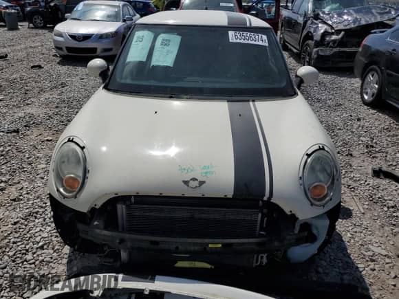 2009 MINI Hardtop with VIN WMWMF33539TT69081, listed as a Copart auction lot 58087205 with 106,470 mi miles and Salvage title. Bid and sale history available at DreamBid. Image 5.