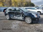 ✅ 2015 Cadillac SRX Luxury Collection • VIN: 3GYFNEE3XFS612665 • Lot: 89852585. Listed on Copart with 121,485 mi. Free auction sales archive from the USA and detailed vehicle history report at DreamBid. Image 4.