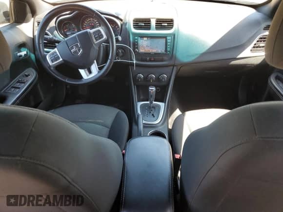 2013 Dodge Avenger SXT with VIN 1C3CDZCB4DN540872, listed as a Copart auction lot 57251525 with 209,534 mi miles and Salvage title. Bid and sale history available at DreamBid. Image 8.