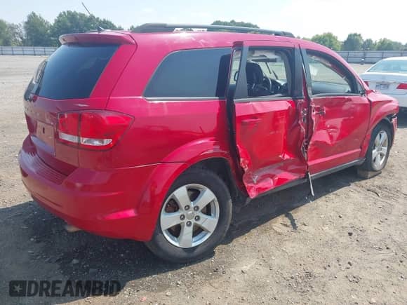 2013 Dodge Journey American Value with VIN 3C4PDCAB7DT500881, listed as a IAAI auction lot 43193439 with 165,029 mi miles and . Bid and sale history available at DreamBid. Image 4.