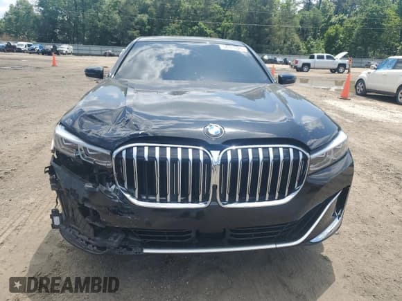 ✅ 2022 BMW 7 Series 740i • VIN: WBA7T2C06NCJ48203 • Лот: 54183325. Опубликован ранее на Copart с пробегом Не указан. Бесплатный доступ к архиву аукционных продаж из США и подробный отчёт об истории автомобиля на DreamBid. Изображение 5.