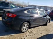 ✅ 2018 Chevrolet Cruze LS • VIN: 1G1BC5SM0J7180644 • Lot: 38956783. Listed on Copart with 49,748 mi. Free auction sales archive from the USA and detailed vehicle history report at DreamBid. Image 3.