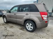 ✅ 2013 Suzuki Grand Vitara Premium • VIN: JS3TE0D60D4100144 • Lot: 60784875. Listed on Copart with 91,842 mi. Free auction sales archive from the USA and detailed vehicle history report at DreamBid. Image 2.