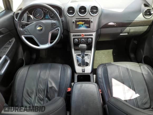2014 Chevrolet Captiva Sport LT с VIN 3GNAL3EK7ES574397, выставлен на аукционе Copart как лот 70479704 с пробегом 160 956 миль миль и Списание • Salvage title. История ставок и продаж доступна на DreamBid. Изображение 8.