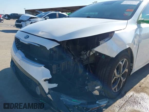 ✅ 2021 Kia Forte LXS • VIN: 3KPF24ADXME360113 • Лот: 43418029. Опубликован ранее на IAAI с пробегом 97 235 миль. Бесплатный доступ к архиву аукционных продаж из США и подробный отчёт об истории автомобиля на DreamBid. Изображение 6.