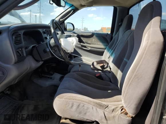 2000 Dodge Dakota Sport z VIN 1B7GG26N7YS667611, wystawiony jako Copart lot #71181355 z przebiegiem 218 471 mil mil oraz Szkoda całkowita • Salvage title. Historia ofert i sprzedaży dostępna na DreamBid. Obrazek 7.