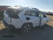 ✅ 2019 Jeep Cherokee Limited • VIN: 1C4PJMDN6KD148755 • Lot: 91837685. Listed on Copart with 60,869 mi. Free auction sales archive from the USA and detailed vehicle history report at DreamBid. Image 3.