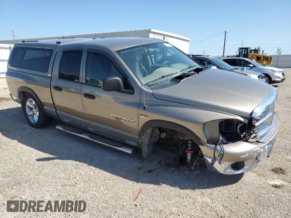 2006 Dodge 1500 Laramie z VIN 1D7HU182X6S677529, wystawiony jako Copart lot #65749695 z przebiegiem 193 955 mil mil oraz Szkoda całkowita • Salvage title. Historia ofert i sprzedaży dostępna na DreamBid. Obrazek 4.