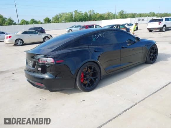 ✅ 2023 Tesla Model S Plaid • VIN: 5YJSA1E64PF518519 • Lot: 43148961. Listed on IAAI with 23,845 mi. Free auction sales archive from the USA and detailed vehicle history report at DreamBid. Image 4.