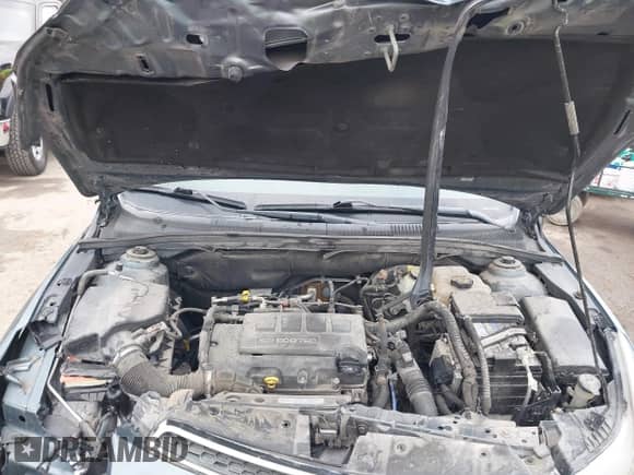 2012 Chevrolet Cruze 1LT z VIN 1G1PF5SC5C7240568, wystawiony jako IAAI lot #43441891 z przebiegiem 100 950 mil mil oraz . Historia ofert i sprzedaży dostępna na DreamBid. Obrazek 10.