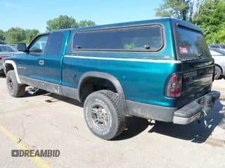 ✅ 1999 Dodge Dakota SLT • VIN: 1B7GG22X3XS104979 • Lot: 42599452. Wystawiony na IAAI z przebiegiem 184 389 mil. Bezpłatny archiwum sprzedaży aukcyjnych z USA i szczegółowy raport historii pojazdu na DreamBid. Zdjęcie 3.