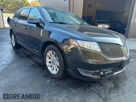 ✅ 2015 Lincoln MKT • VIN: 2LMHJ5NK0FBL03293 • Lot: 69918275. Wystawiony na Copart z przebiegiem 115 725 mil. Bezpłatny archiwum sprzedaży aukcyjnych z USA i szczegółowy raport historii pojazdu na DreamBid. Zdjęcie 1.