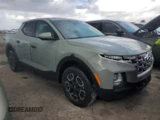 2022 Hyundai Santa Cruz SEL z VIN 5NTJB4AE9NH036216, wystawiony jako Copart lot #78818104 z przebiegiem 12 248 mil mil oraz Nie do naprawy • Non repairable. Historia ofert i sprzedaży dostępna na DreamBid. Obrazek 4.