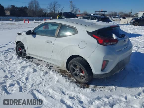 2019 Hyundai Veloster Premium with VIN KMHTG6AFXKU018415, listed as a IAAI auction lot 41575175 with 71,978 mi miles and . Bid and sale history available at DreamBid. Image 3.