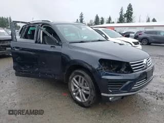 ✅ 2016 Volkswagen Touareg Lux • VIN: WVGEF9BP0GD011369 • Lot: 43772482. Listed on IAAI with 39,681 mi. Free auction sales archive from the USA and detailed vehicle history report at DreamBid. Image 1.