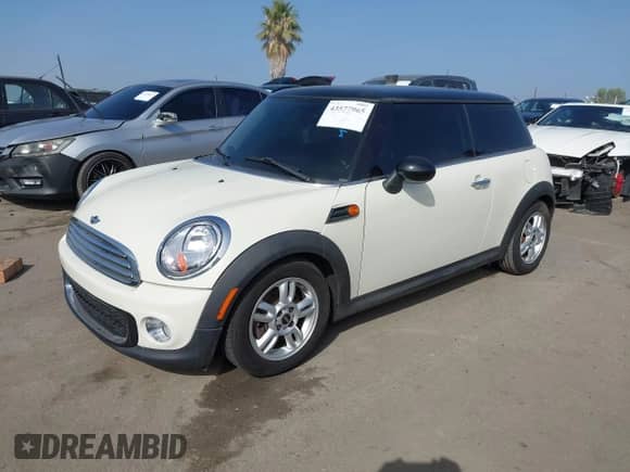 2012 MINI Hardtop with VIN WMWSU3C51CT257108, listed as a IAAI auction lot 43577965 with 127,914 mi miles and . Bid and sale history available at DreamBid. Image 2.