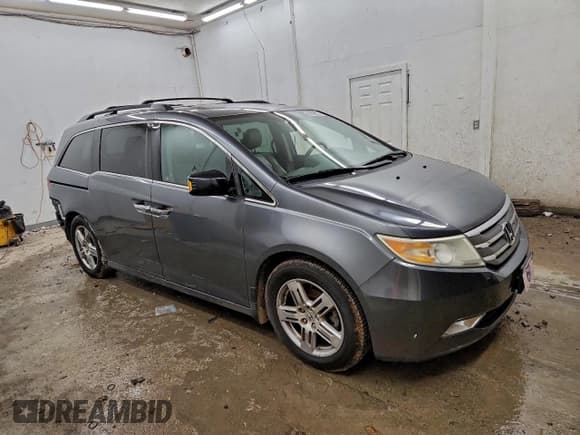 ✅ 2012 Honda Odyssey Touring • VIN: 5FNRL5H96CB130580 • Lot: 95648755. Listed on Copart with 226,387 mi. Free auction sales archive from the USA and detailed vehicle history report at DreamBid. Image 4.