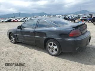 ✅ 2002 Pontiac Grand Am GT1 • VIN: 1G2NV12E42C277892 • Lot: 65276464. Wystawiony na Copart z przebiegiem 157 880 mil. Bezpłatny archiwum sprzedaży aukcyjnych z USA i szczegółowy raport historii pojazdu na DreamBid. Zdjęcie 2.