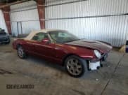 ✅ 2004 Ford Thunderbird Deluxe • VIN: 1FAHP60A24Y102889 • Lot: 70025635. Listed on Copart with 110,946 mi. Free auction sales archive from the USA and detailed vehicle history report at DreamBid. Image 4.