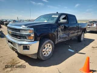 2015 Chevrolet Silverado 2500HD LT with VIN 1GC1KVEG5FF186819, listed as a Copart auction lot 71086935 with 161,767 mi miles and Salvage title. Bid and sale history available at DreamBid. Image 1.