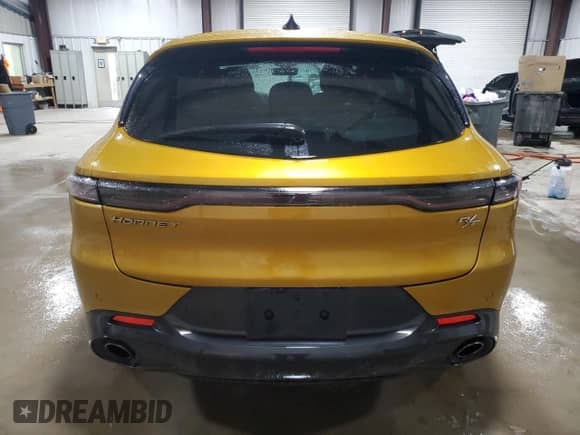 2024 Dodge Hornet R/T z VIN ZACPDFCW4R3A12088, wystawiony jako Copart lot #52515655 z przebiegiem 21 696 mil mil oraz Szkoda całkowita • Salvage title. Historia ofert i sprzedaży dostępna na DreamBid. Obrazek 6.