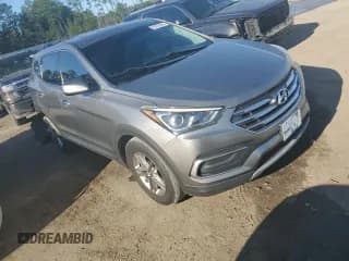 ✅ 2018 Hyundai Santa Fe 2.4L • VIN: 5NMZT3LB7JH083375 • Лот: 81875863. Опубликован ранее на Copart с пробегом 96 909 миль. Бесплатный доступ к архиву аукционных продаж из США и подробный отчёт об истории автомобиля на DreamBid. Изображение 4.