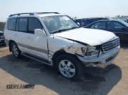 ✅ 2003 Toyota Land Cruiser • VIN: JTEHT05J732046635 • Lot: 42999962. Listed on IAAI with 263,143 mi. Free auction sales archive from the USA and detailed vehicle history report at DreamBid. Image 1.