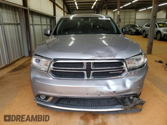 2014 Dodge Durango SXT с VIN 1C4RDHAG9EC286751, выставлен на аукционе Copart как лот 70119955 с пробегом 242 736 миль миль и Списание • Salvage title. История ставок и продаж доступна на DreamBid. Изображение 5.