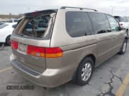✅ 2004 Honda Odyssey EX-L • VIN: 5FNRL18944B024672 • Lot: 43690922. Wystawiony na IAAI z przebiegiem 149 891 mil. Bezpłatny archiwum sprzedaży aukcyjnych z USA i szczegółowy raport historii pojazdu na DreamBid. Zdjęcie 4.