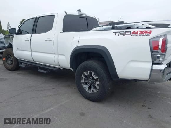 ✅ 2023 Toyota Tacoma SR5 • VIN: 3TMDZ5BN9PM169017 • Lot: 42724717. Listed on IAAI with 28,467 mi. Free auction sales archive from the USA and detailed vehicle history report at DreamBid. Image 3.