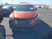 2015 Hyundai Santa Fe z VIN 5XYZTDLBXFG266793, wystawiony jako IAAI lot #43588575 z przebiegiem 129 838 mil mil oraz . Historia ofert i sprzedaży dostępna na DreamBid. Obrazek 12.