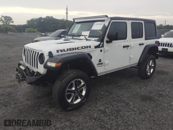 ✅ 2021 Jeep Wrangler Unlimited Rubicon • VIN: 1C4HJXFN1MW796739 • Лот: 42540683. Опубликован ранее на IAAI с пробегом 56 864 миль. Бесплатный доступ к архиву аукционных продаж из США и подробный отчёт об истории автомобиля на DreamBid. Изображение 2.