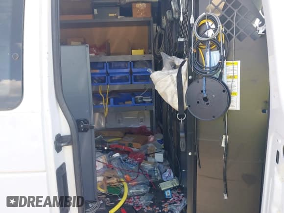 ✅ 2013 Ford Econoline Cargo Commercial • VIN: 1FTNE1EW5DDB01348 • Lot: 42831731. Listed on IAAI with 125,715 mi. Free auction sales archive from the USA and detailed vehicle history report at DreamBid. Image 8.