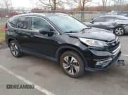 ✅ 2015 Honda CR-V Touring • VIN: 5J6RM4H9XFL130777 • Лот: 43522733. Опубликован ранее на IAAI с пробегом 87 722 миль. Бесплатный доступ к архиву аукционных продаж из США и подробный отчёт об истории автомобиля на DreamBid. Изображение 1.