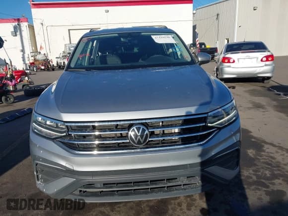 ✅ 2023 Volkswagen Tiguan S • VIN: 3VVRB7AX6PM128936 • Лот: 43429530. Опубликован ранее на IAAI с пробегом 51 069 миль. Бесплатный доступ к архиву аукционных продаж из США и подробный отчёт об истории автомобиля на DreamBid. Изображение 13.