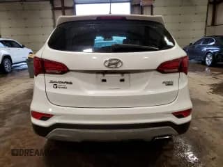 ✅ 2018 Hyundai Santa Fe 2.4L • VIN: 5NMZTDLB3JH094668 • Лот: 65785084. Опубликован ранее на Copart с пробегом 71 472 миль. Бесплатный доступ к архиву аукционных продаж из США и подробный отчёт об истории автомобиля на DreamBid. Изображение 6.