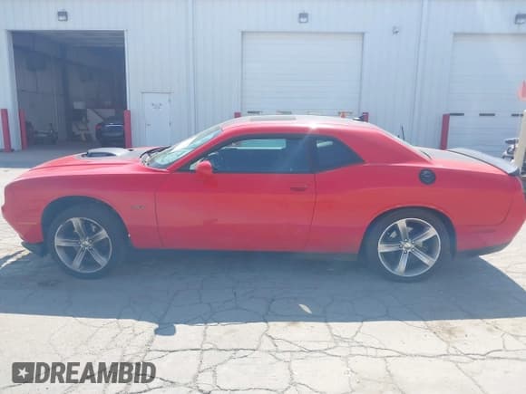 ✅ 2016 Dodge Challenger R/T Plus • VIN: 2C3CDZBT3GH299992 • Lot: 43188443. Listed on IAAI with 57,177 mi. Free auction sales archive from the USA and detailed vehicle history report at DreamBid. Image 14.
