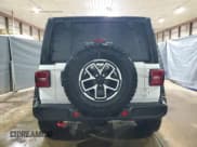 ✅ 2024 Jeep Wrangler Rubicon • VIN: 1C4PJXFG3RW300831 • Lot: 82029925. Listed on Copart with 29,328 mi. Free auction sales archive from the USA and detailed vehicle history report at DreamBid. Image 6.