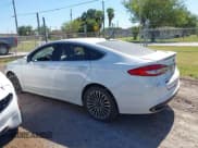 ✅ 2018 Ford Fusion Titanium • VIN: 3FA6P0D99JR124788 • Lot: 42789944. Listed on IAAI with 127,499 mi. Free auction sales archive from the USA and detailed vehicle history report at DreamBid. Image 14.