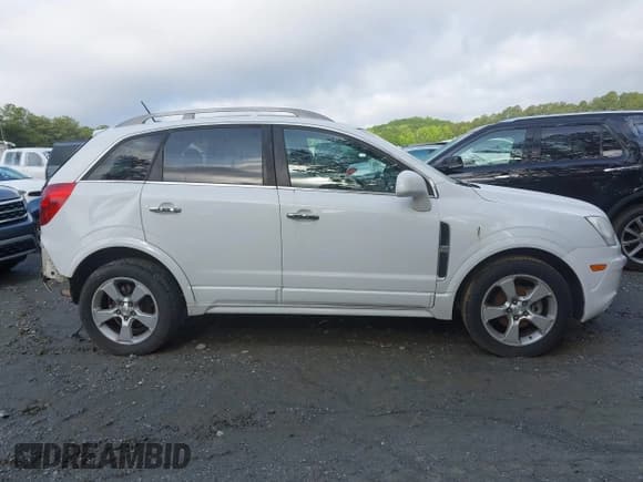 ✅ 2014 Chevrolet Captiva Sport LTZ • VIN: 3GNAL4EK7ES512679 • Lot: 42379016. Wystawiony na IAAI z przebiegiem 160 401 mil. Bezpłatny archiwum sprzedaży aukcyjnych z USA i szczegółowy raport historii pojazdu na DreamBid. Zdjęcie 13.
