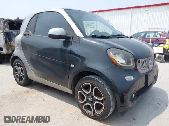 ✅ 2016 Smart fortwo Passion • VIN: WMEFJ5DA5GK049783 • Lot: 42472414. Wystawiony na IAAI z przebiegiem 95 182 mil. Bezpłatny archiwum sprzedaży aukcyjnych z USA i szczegółowy raport historii pojazdu na DreamBid. Zdjęcie 1.