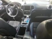 ✅ 2015 Jeep Grand Cherokee Altitude • VIN: 1C4RJEAG9FC125406 • Лот: 80031455. Опубликован ранее на Copart с пробегом 125 320 миль. Бесплатный доступ к архиву аукционных продаж из США и подробный отчёт об истории автомобиля на DreamBid. Изображение 8.