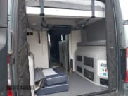 ✅ 2023 Mercedes-Benz Sprinter Cargo • VIN: W1W4EBVY7MP424550 • Lot: 42372466. Listed on IAAI with Not provided. Free auction sales archive from the USA and detailed vehicle history report at DreamBid. Image 18.