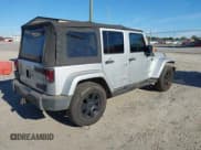 ✅ 2007 Jeep Wrangler Unlimited Sahara • VIN: 1J4GB59167L152708 • Lot: 43722971. Listed on IAAI with 215,920 mi. Free auction sales archive from the USA and detailed vehicle history report at DreamBid. Image 4.