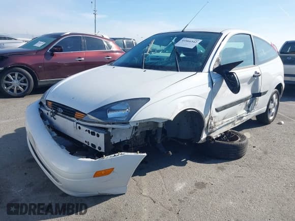 ✅ 2003 Ford Focus ZX3 • VIN: 3FAFP31ZX3R163723 • Lot: 41866542. Listed on IAAI with 83,370 mi. Free auction sales archive from the USA and detailed vehicle history report at DreamBid. Image 2.