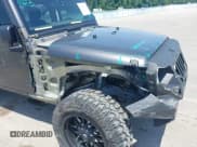 ✅ 2017 Jeep Wrangler Unlimited Sahara • VIN: 1C4BJWEG4HL590003 • Lot: 42593115. Listed on IAAI with 80,138 mi. Free auction sales archive from the USA and detailed vehicle history report at DreamBid. Image 18.